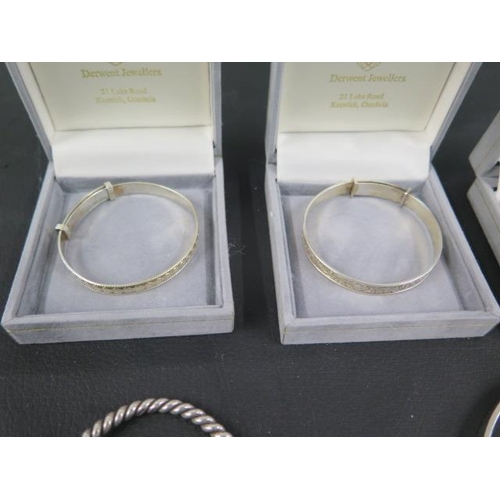 58 - Two sterling silver child's bracelets, slide adjusting, one with Birmingham hallmarks, the other mar... 