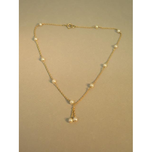 69 - A 9ct hallmarked yellow gold and pearl necklace - approx 41cm - weight approx 5 grams - good overall... 