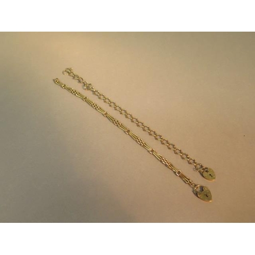 75 - Two 9ct yellow gold bracelets with heart locks, hallmarked - both approx 19cm - total weight approx ... 