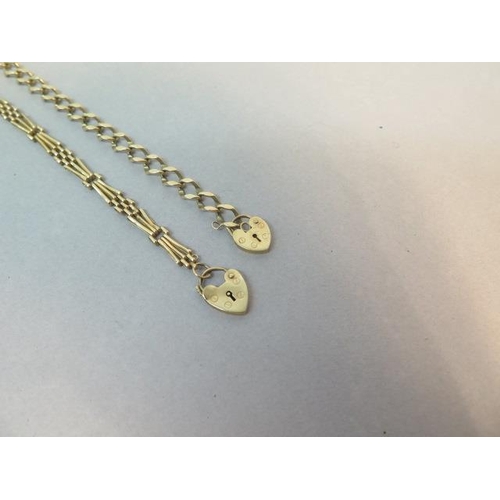 75 - Two 9ct yellow gold bracelets with heart locks, hallmarked - both approx 19cm - total weight approx ... 