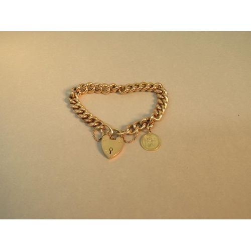 80 - A 9ct rose gold (hallmarked) Albert link bracelet with heart lock and St Christopher charm - weight ... 