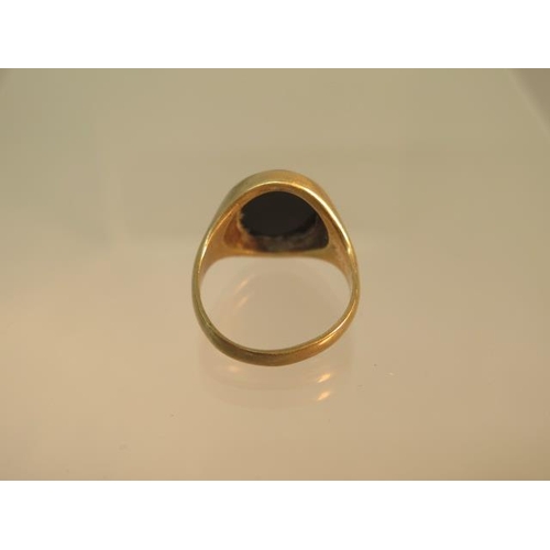 82 - A 9ct yellow gold (hallmarked) Masonic gents signet ring size Q - weight approx 6.9 grams