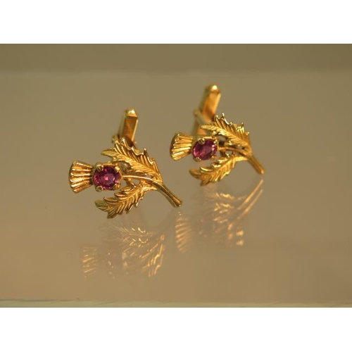 88 - A pair of 9ct gold (hallmarked) ruby cufflinks as Scottish thistles - approx 2.5cm - weight approx 8... 