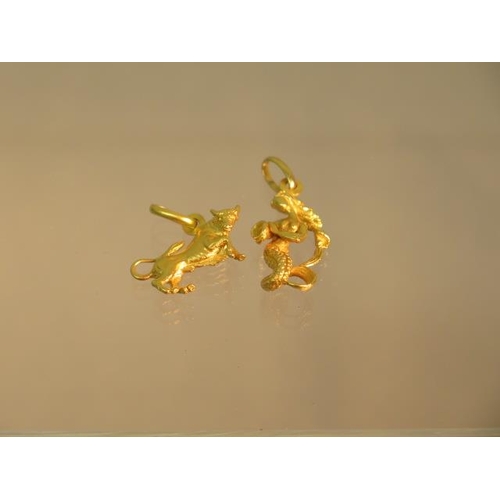 92 - Two 18ct yellow gold (hallmarked) charms of a bull and a mermaid - 2.2cm and 2.5cm - total weight ap... 