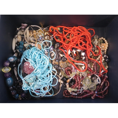 155 - A quantity of costume jewellery - necklaces, earrings etc