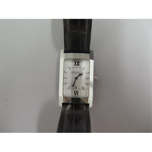 246 - A gents Dunhill steel cased quartz wristwatch, rectangular case approx 35mm x 23mm - silver dial wit... 