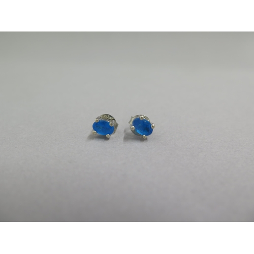 97 - A pair of neon blue apatite studs in silver