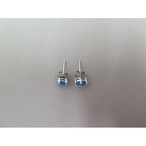 97 - A pair of neon blue apatite studs in silver