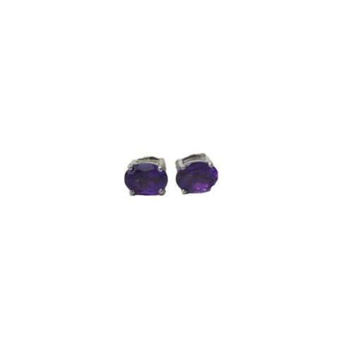 128 - A pair of amethyst studs in silver