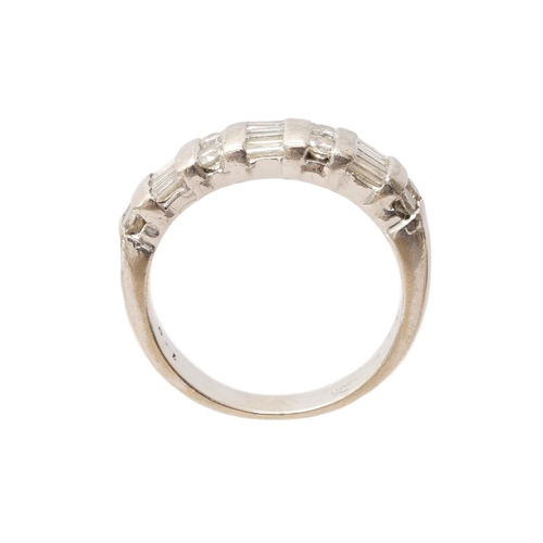 161 - A good 18ct white gold and diamond half eternity ring set with eight round brilliant cut diamonds an... 