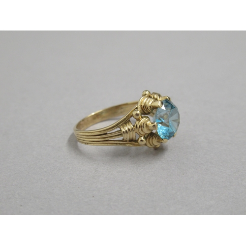 15 - A French 18ct yellow gold hallmarked blue topaz ring, topaz approx 7mm diameter, size L/M, approx 4.... 