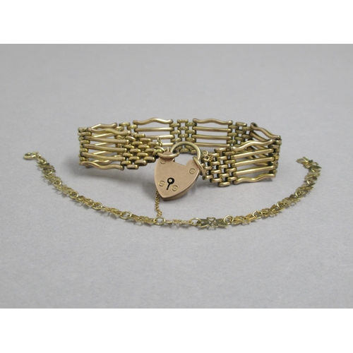 170 - A 9ct yellow gold (hallmarked) gate link bracelet with heart lock - good overall condition, approx w... 