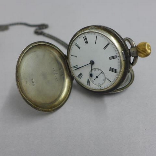 171 - A .935 silver (hallmarked) double case full hunter pocket watch - approx 5cm - not currently working... 