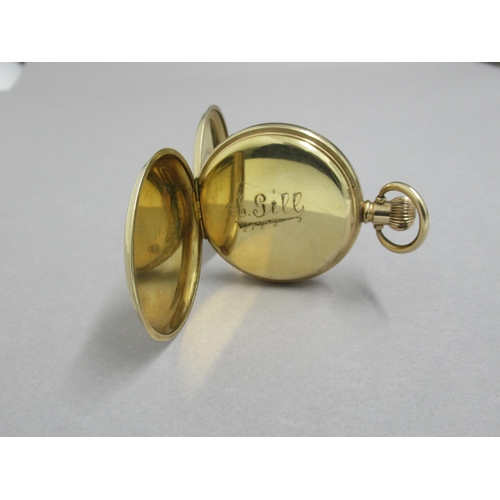 238 - A yellow gold plated half hunter pocket watch - 5cm - good overall condition, working in the saleroo... 