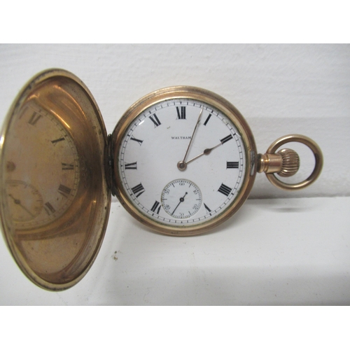 253 - A Waltham gold plated full Hunter pocket watch - case approx 5cm - good overall condition - working ... 