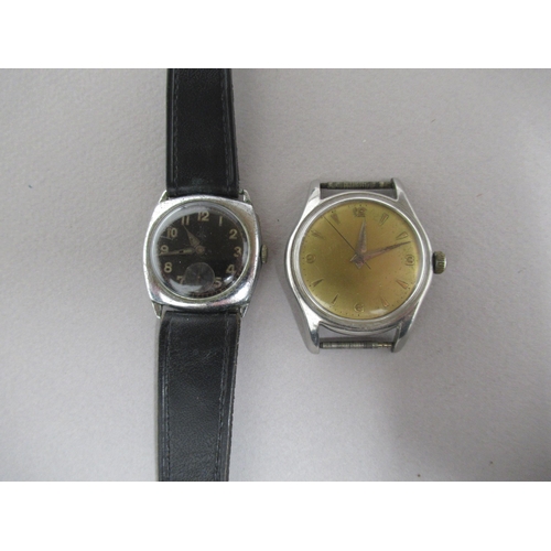 264 - Two steel cased wrist watches, the 1st has a round 34mm case, working in saleroom, dated 1963, and t... 