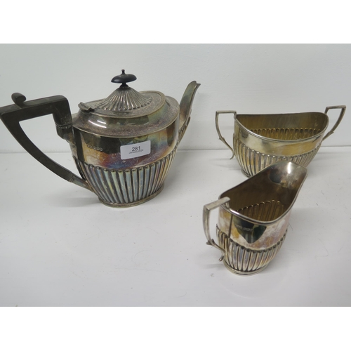 281 - A silver three piece tea set - James Dixon & Sons, Sheffield 1923 - teapot approx 25cm x 15cm - gros... 