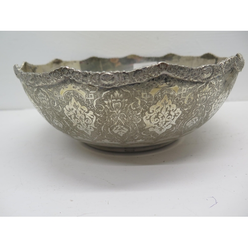 282 - A Middle Eastern silver bowl (hallmarked and tested) finely chased decoration - approx 21cm diameter... 