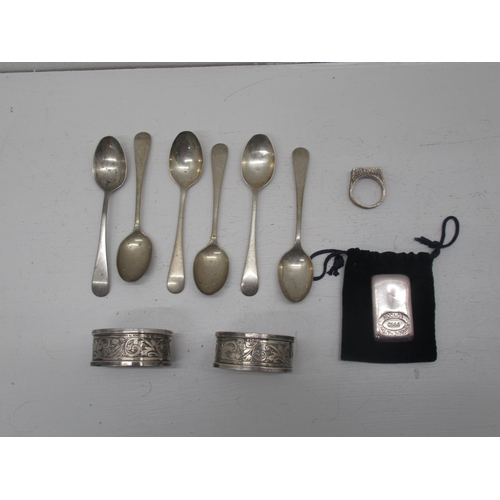 293 - 6 silver teaspoons, 2 silver napkin rings and a silver ring, approx 3.5 troy oz, and a 100g silver .... 