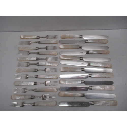 297 - A set of 12 George IV silver and mother of pearl handled dessert forks, Aaron Hadfield Sheffield 182... 