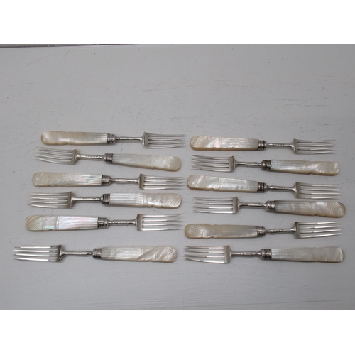 297 - A set of 12 George IV silver and mother of pearl handled dessert forks, Aaron Hadfield Sheffield 182... 