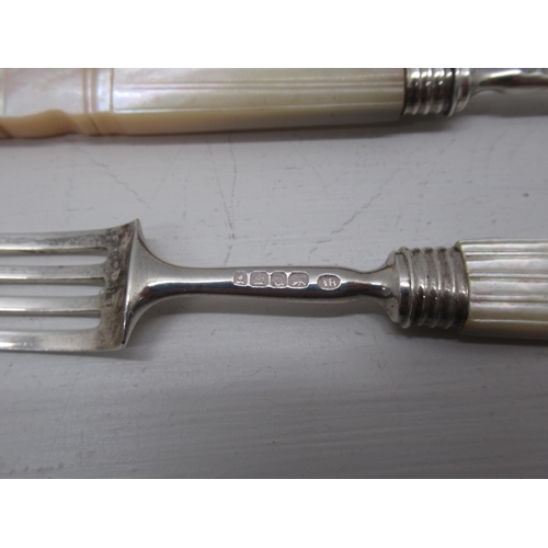 297 - A set of 12 George IV silver and mother of pearl handled dessert forks, Aaron Hadfield Sheffield 182... 