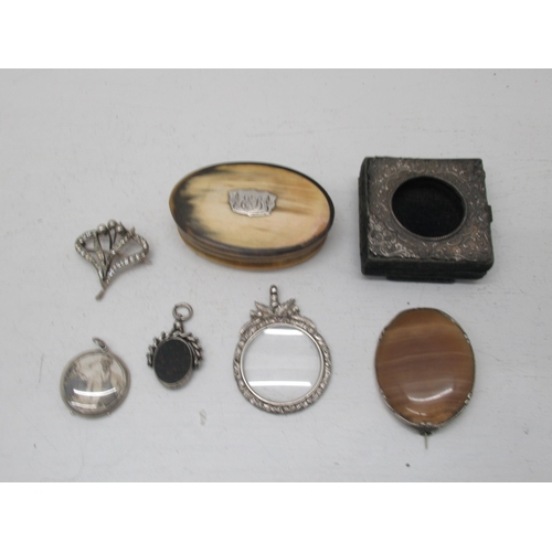 306 - Silver items including brooches, pendants, watch fob, frame and horn box