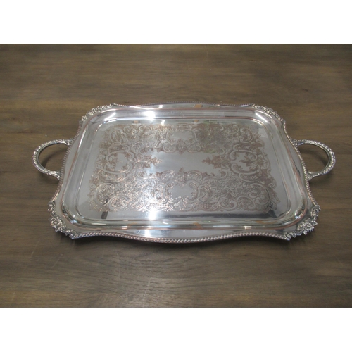 308 - Two Sheffield silver plate trays - larger oval shaped with pierced gallery approx 61cm x 41cm