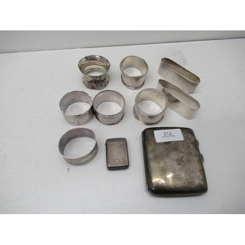 312 - A Victorian silver vesta case, silver cigarette case, and eight silver napkin rings - total weight a... 