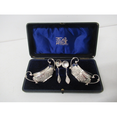 316 - A boxed pair of silver salts - John Millward Banks, Birmingham 1896 - with matching spoons and blue ... 