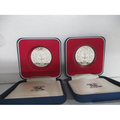 322 - Two Royal Mint silver proof coins - 1977 Queen Elizabeth II Silver Jubilee - boxed