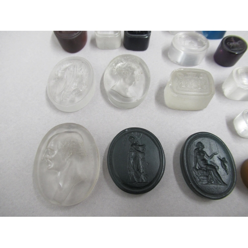 352 - James Tassie Intaglio seals - a collection of 17 clear and coloured