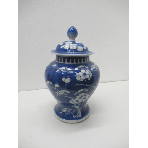 353 - A Chinese blue and white prunus temple jar and cover, 4 character mark to base, approx 22cm, good ov... 