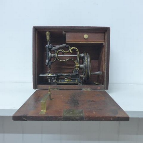 380 - A Charles Raymond's Family chain stitch sewing machine retailed by JG Weir circa 1867 - in good cond... 