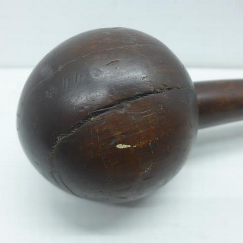 391 - A Southsea Islands hardwood throwing club - Length 64cm