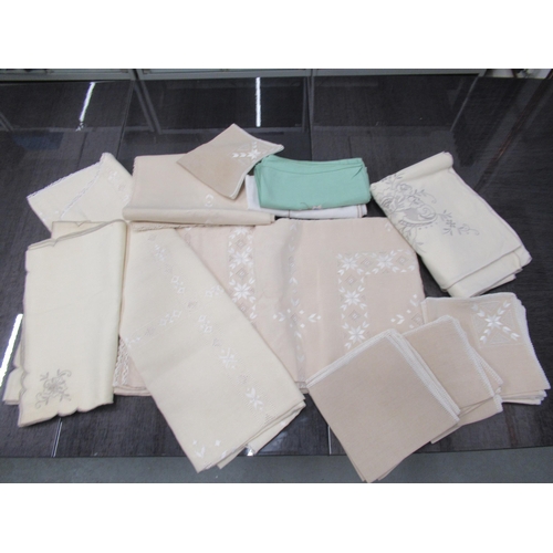 408 - A quantity of embroidered linen table cloths etc