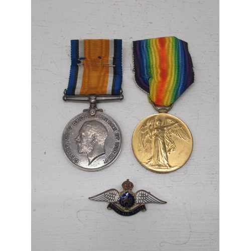 448 - WWI medal pair - Victory and War Medal, 24715 PTE A.V. Stone, East Surrey Reg, together with an enam... 