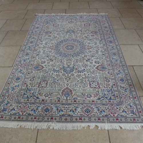 488 - A hand woven Nain Persian rug - 300cm x 196cm