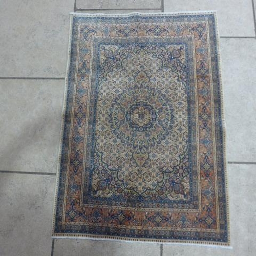 491 - A fine Tabriz hand knotted woollen rug - 1.63m x 1.00m