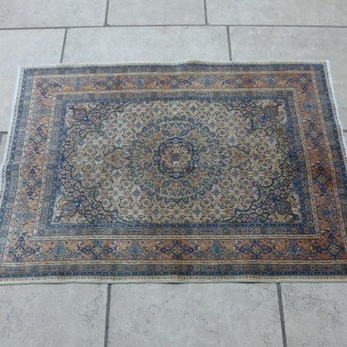 491 - A fine Tabriz hand knotted woollen rug - 1.63m x 1.00m