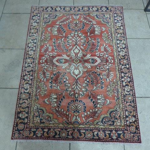 492 - A Lillihan hand knotted woollen rug - 2.10m x 1.53m