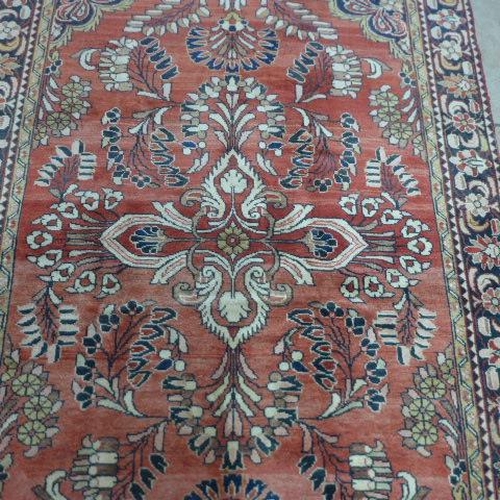 492 - A Lillihan hand knotted woollen rug - 2.10m x 1.53m