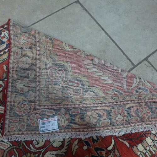 492 - A Lillihan hand knotted woollen rug - 2.10m x 1.53m