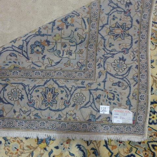 493 - A Kashan hand knotted woollen rug - 2.70m x 1.52m