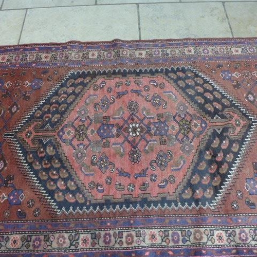 494 - A Hamadan hand knotted woollen rug - 2.26m x 1.30m