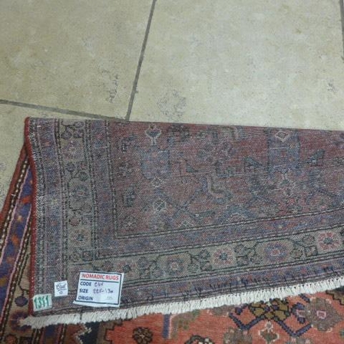 494 - A Hamadan hand knotted woollen rug - 2.26m x 1.30m