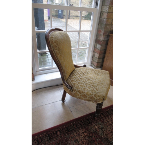 516 - A 19th century mahogany nursing chair for restoration