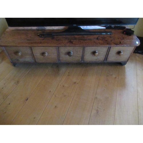 529 - An antique pine five drawer chest/TV stand - Width 147cm x Depth 65cm x Height 39cm