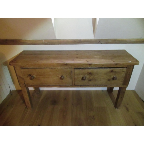 535 - An antique pine dresser base with two drawers - Width 162cm x Height 82cm x Depth 50cm