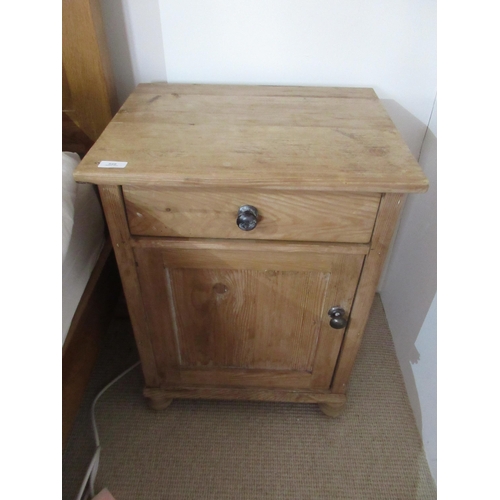 550 - A pine bedside cupboard